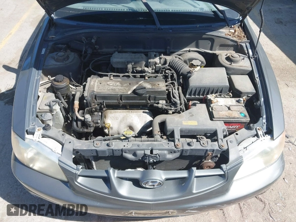 2001 Hyundai Accent GLS z VIN KMHCG35C01U136132, wystawiony jako IAAI lot #42293830 z przebiegiem 111 906 mil mil oraz . Historia ofert i sprzedaży dostępna na DreamBid. Obrazek 10.
