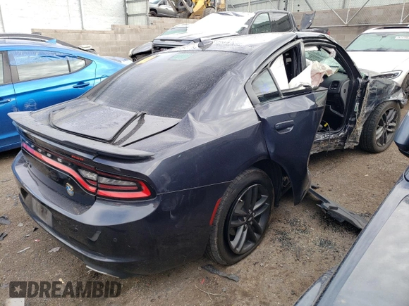2019 Dodge Charger SXT with VIN 2C3CDXJGXKH542327, listed as a Copart auction lot 76716243 with Not Provided miles and Salvage Title. Bid and sale history available at DreamBid. Image 3.