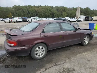 1998 Mazda 626 DX with VIN 1YVGF22CXW5775511, listed as a Copart auction lot 78748784 with 158,570 mi miles and Salvage Title. Bid and sale history available at carsss.com. Image 3.