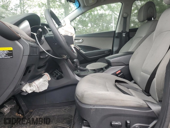 2017 Hyundai Santa Fe 2.4L z VIN 5NMZU3LB8HH032409, wystawiony jako Copart lot #57939915 z przebiegiem 105 494 mil mil oraz Szkoda całkowita • Salvage title. Historia ofert i sprzedaży dostępna na DreamBid. Obrazek 7.