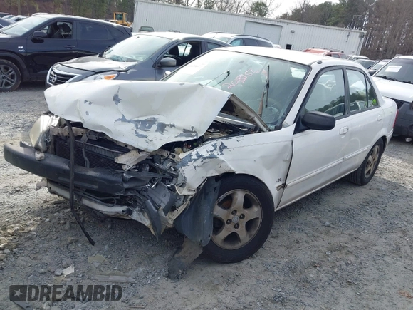 2000 Mazda Protege DX with VIN JM1BJ2221Y0208156, listed as a IAAI auction lot 41609657 with 435,304 mi miles and . Bid and sale history available at DreamBid. Image 16.