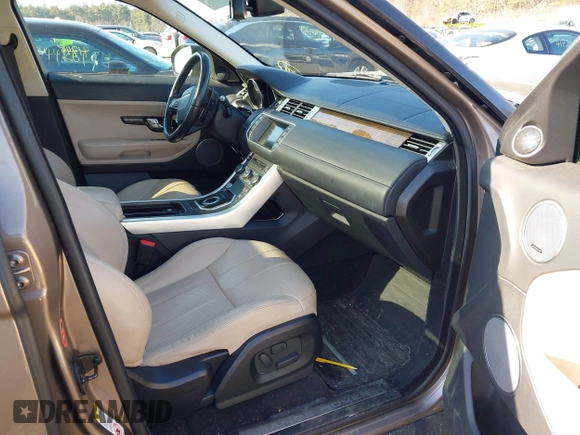 2015 Land Rover Range Rover Evoque Prestige with VIN SALVV2BG1FH001240, listed as a IAAI auction lot 41768760 with 98,711 mi miles and . Bid and sale history available at DreamBid. Image 5.