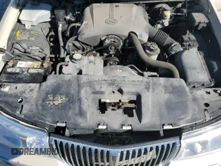 2001 Lincoln Town Car Cartier z VIN 1LNHM83W31Y671814, wystawiony jako Copart lot #77169664 z przebiegiem Nie podano mil oraz Szkoda całkowita • Salvage title. Historia ofert i sprzedaży dostępna na DreamBid. Obrazek 11.