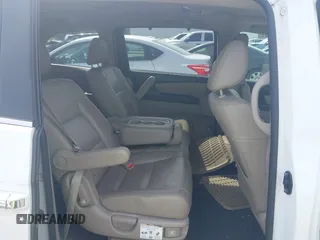 2012 Honda Odyssey EX-L with VIN 5FNRL5H65CB082916, listed as a IAAI auction lot 42052713 with 217,267 mi miles and . Bid and sale history available at carsss.com. Image 8.