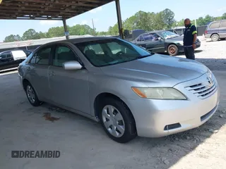 2007 Toyota Camry CE z VIN 4T1BE46K57U053673, wystawiony jako IAAI lot #42319748 z przebiegiem 173 154 mil mil oraz . Historia ofert i sprzedaży dostępna na DreamBid. Obrazek 1.