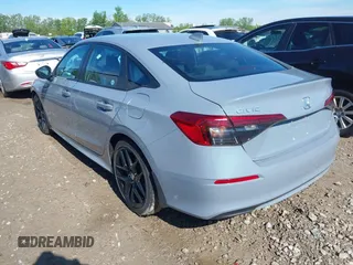 2023 Honda Civic Sport with VIN 2HGFE2F55PH517831, listed as a IAAI auction lot 42255985 with 31,554 mi miles and . Bid and sale history available at DreamBid. Image 3.