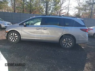 2025 Honda Odyssey EX-L with VIN 5FNRL6H64SB016104, listed as a IAAI auction lot 41456550 with 61 mi miles and . Bid and sale history available at DreamBid. Image 14.