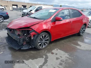 2017 Toyota Corolla L z VIN 5YFBURHE3HP715325, wystawiony jako IAAI lot #41804657 z przebiegiem 74 648 mil mil oraz . Historia ofert i sprzedaży dostępna na DreamBid. Obrazek 2.
