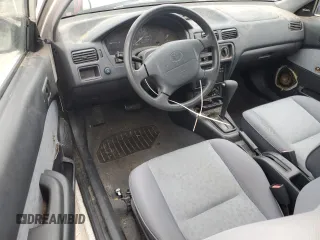 1998 Toyota Tercel DX z VIN JT2AC52L2W0307400, wystawiony jako Copart lot #80497644 z przebiegiem 72 167 mil mil oraz Czysty tytuł • Clean title. Historia ofert i sprzedaży dostępna na DreamBid. Obrazek 8.