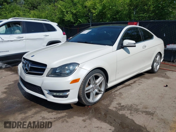 2014 Mercedes-Benz C 250 with VIN WDDGJ4HB9EG186697, listed as a IAAI auction lot 42447765 with 99,700 mi miles and . Bid and sale history available at DreamBid. Image 2.
