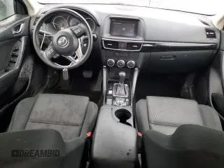 2016 Mazda CX-5 Sport z VIN JM3KE4BY5G0726376, wystawiony jako Copart lot #52009995 z przebiegiem 113 533 mil mil oraz Szkoda całkowita • Salvage title. Historia ofert i sprzedaży dostępna na DreamBid. Obrazek 8.
