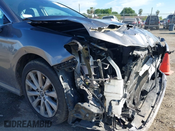 2019 Toyota Camry LE with VIN 4T1B11HK4KU254853, listed as a IAAI auction lot 42013255 with 153,664 mi miles and . Bid and sale history available at DreamBid. Image 18.
