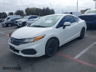 2015 Honda Civic Coupe LX with VIN 2HGFG3B55FH517865, listed as a IAAI auction lot 42056572 with 147,074 mi miles. Bid and sale history available at carsss.com. Image 2.