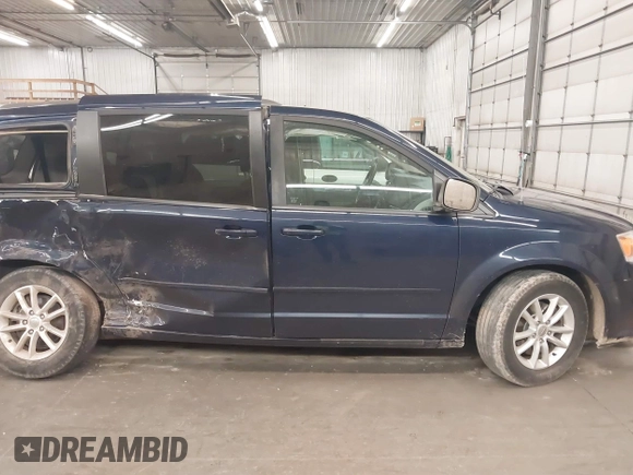 2015 Dodge Grand Caravan SXT with VIN 2C4RDGCG9FR632376, listed as a IAAI auction lot 41903984 with 238,723 mi miles and . Bid and sale history available at DreamBid. Image 14.