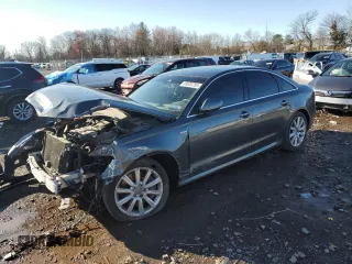 2015 Audi A6 3.0T Prestige with VIN WAUHGAFC0FN038956, listed as a Copart auction lot 49525755 with 135,972 mi miles and Salvage Title. Bid and sale history available at carsss.com. Image 1.