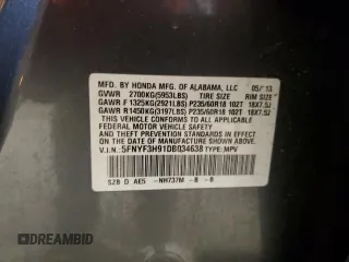 2013 Honda Pilot Touring z VIN 5FNYF3H91DB034638, wystawiony jako Copart lot #59858755 z przebiegiem 115 445 mil mil oraz Szkoda całkowita • Salvage title. Historia ofert i sprzedaży dostępna na DreamBid. Obrazek 13.