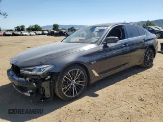 2022 BMW 5 Series 530e xDrive with VIN WBA33AG08NCH70842, listed as a Copart auction lot 56041295 with 84,151 mi miles and Salvage title. Bid and sale history available at DreamBid. Image 1.