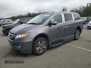 2015 Honda Odyssey Touring Elite with VIN 5FNRL5H97FB037913, listed as a Copart auction lot 63793285 with 119,284 mi miles and Clean title. Bid and sale history available at DreamBid. Image 1.
