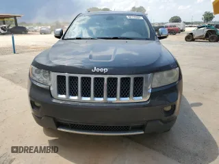 2013 Jeep Grand Cherokee Overland with VIN 1C4RJECT7DC526119, listed as a Copart auction lot 60735594 with 143,454 mi miles and Clean Title. Bid and sale history available at carsss.com. Image 5.