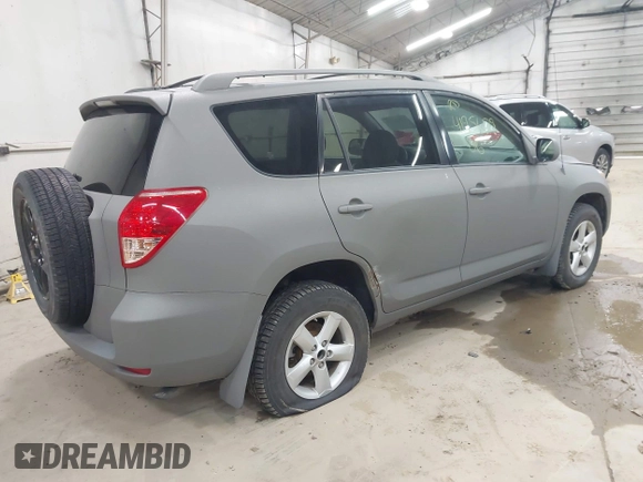 2006 Toyota RAV4 with VIN JTMBK33V365008438, listed as a IAAI auction lot 41956179 with 215,690 mi miles. Bid and sale history available at carsss.com. Image 4.