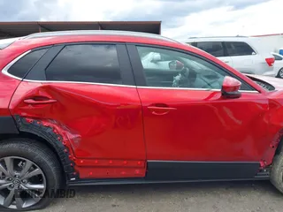 2024 Mazda CX-30 S Carbon Edition with VIN 3MVDMBCM6RM627083, listed as a IAAI auction lot 41715241 with 23,855 mi miles and . Bid and sale history available at DreamBid. Image 13.