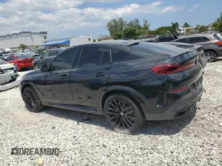 2023 BMW X6 M50i z VIN 5UXCY8C02P9P48141, wystawiony jako Copart lot #52531895 z przebiegiem 33 764 mil mil oraz Szkody całkowita. Historia ofert i sprzedaży dostępna na DreamBid. Obrazek 2.