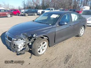 2015 BMW 3 Series 328i xDrive with VIN WBA3B5G5XFNS13908, listed as a IAAI auction lot 41638788 with 54,584 mi miles. Bid and sale history available at carsss.com. Image 2.