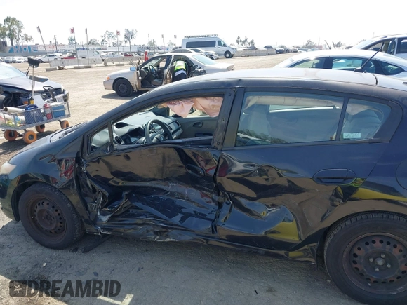 2010 Honda Insight LX with VIN JHMZE2H50AS014165, listed as a IAAI auction lot 42381535 with 169,032 mi miles and . Bid and sale history available at DreamBid. Image 6.