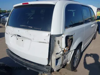 2014 Chrysler Town & Country Touring with VIN 2C4RC1BG4ER156134, listed as a IAAI auction lot 41978659 with 169,670 mi miles. Bid and sale history available at carsss.com. Image 6.
