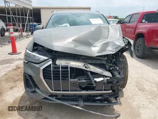 2021 Audi Q3 S line Premium z VIN WA1DECF33M1040282, wystawiony jako IAAI lot #42162587 z przebiegiem 90 509 mil mil oraz . Historia ofert i sprzedaży dostępna na DreamBid. Obrazek 13.