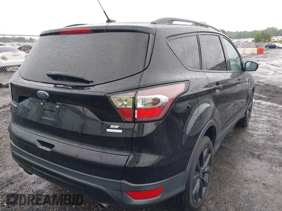 2017 Ford Escape SE with VIN 1FMCU0GD3HUD07141, listed as a IAAI auction lot 42250771 with 116,086 mi miles and . Bid and sale history available at DreamBid. Image 21.