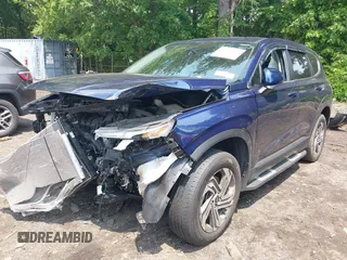 2021 Hyundai Santa Fe SE with VIN 5NMS1DAJXMH344025, listed as a IAAI auction lot 42477124 with 17,129 mi miles and . Bid and sale history available at DreamBid. Image 2.