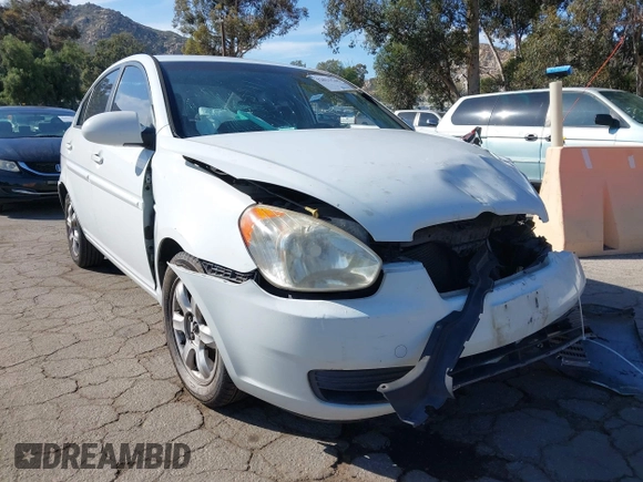 2006 Hyundai Accent GLS with VIN KMHCN46C36U040545, listed as a IAAI auction lot 42021545 with 224,058 mi miles. Bid and sale history available at carsss.com. Image 12.