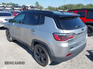 2021 Jeep Compass Altitude with VIN 3C4NJCBB5MT509187, listed as a IAAI auction lot 42021788 with 51,841 mi miles. Bid and sale history available at carsss.com. Image 3.