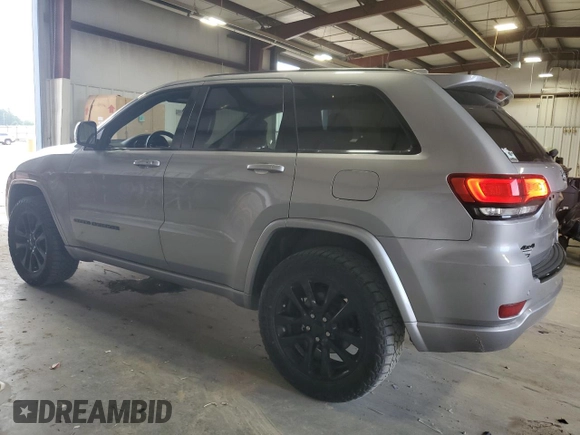 2017 Jeep Grand Cherokee Altitude with VIN 1C4RJFAG9HC772705, listed as a Copart auction lot 61562925 with 184,004 mi miles and Salvage title. Bid and sale history available at DreamBid. Image 2.