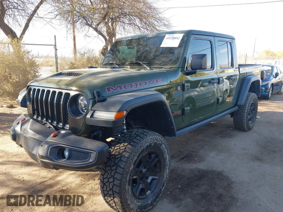 2021 Jeep Gladiator Mojave with VIN 1C6JJTEG8ML606876, listed as a IAAI auction lot 41632052 with 30,255 mi miles and . Bid and sale history available at DreamBid. Image 17.