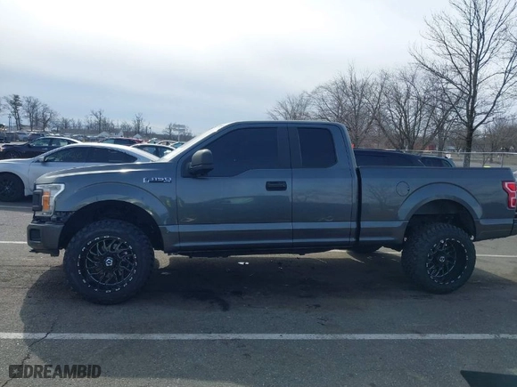 2019 Ford F-150 XL with VIN 1FTEX1EPXKFC28651, listed as a IAAI auction lot 41622474 with 80,693 mi miles. Bid and sale history available at carsss.com. Image 14.