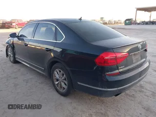 2016 Volkswagen Passat 1.8T R-Line w/Comfort Pkg with VIN 1VWAS7A33GC018434, listed as a IAAI auction lot 41770301 with 151,169 mi miles. Bid and sale history available at carsss.com. Image 3.