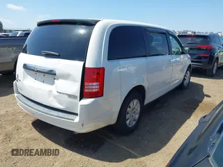 2009 Chrysler Town & Country LX with VIN 2A8HR44E79R549129, listed as a IAAI auction lot 42079369 with 102,805 mi miles. Bid and sale history available at carsss.com. Image 4.