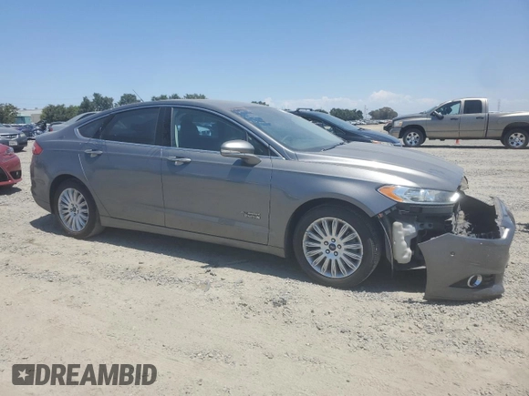 2013 Ford Fusion Titanium with VIN 3FA6P0SU2DR351610, listed as a Copart auction lot 63422525 with 198,741 mi miles and Salvage title. Bid and sale history available at DreamBid. Image 4.