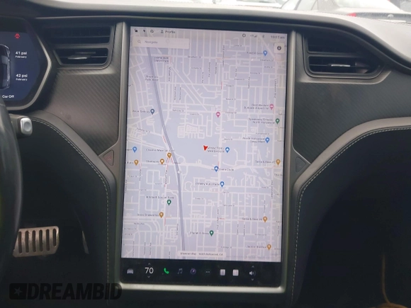 2018 Tesla Model S 75D with VIN 5YJSA1E42JF265691, listed as a IAAI auction lot 41886105 with 99,485 mi miles and . Bid and sale history available at DreamBid. Image 18.