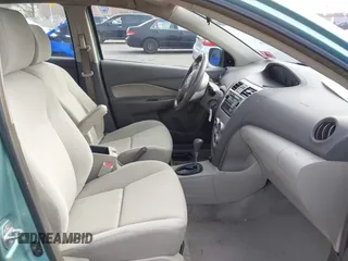 2009 Toyota Yaris with VIN JTDBT903794060474, listed as a IAAI auction lot 42005903 with 104,607 mi miles. Bid and sale history available at carsss.com. Image 5.