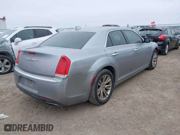 2015 Chrysler 300 C with VIN 2C3CCAEG0FH779540, listed as a IAAI auction lot 41542982 with 211,348 mi miles and . Bid and sale history available at carsss.com. Image 4.