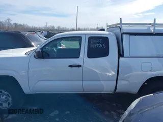 2021 Toyota Tacoma SR with VIN 3TYRX5GN6MT007673, listed as a IAAI auction lot 41691995 with 97,735 mi miles and . Bid and sale history available at DreamBid. Image 14.