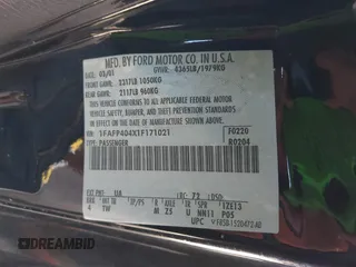 2001 Ford Mustang Standard z VIN 1FAFP404X1F171021, wystawiony jako IAAI lot #41998734 z przebiegiem Nie podano mil oraz . Historia ofert i sprzedaży dostępna na DreamBid. Obrazek 9.