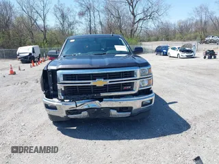 2015 Chevrolet Silverado 1500 LT with VIN 3GCUKREC8FG510992, listed as a IAAI auction lot 41966354 with 176,347 mi miles. Bid and sale history available at carsss.com. Image 13.