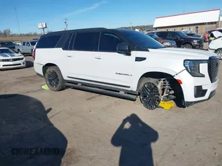 2021 GMC Yukon XL Denali with VIN 1GKS2JKT1MR401207, listed as a IAAI auction lot 41242619 with 87,902 mi miles and . Bid and sale history available at carsss.com. Image 6.