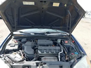 2003 Honda Civic LX with VIN 2HGES16583H594640, listed as a IAAI auction lot 42157801 with 167,981 mi miles. Bid and sale history available at carsss.com. Image 10.