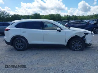2022 Mazda CX-9 Touring z VIN JM3TCBCY7N0600787, wystawiony jako IAAI lot #42240512 z przebiegiem 27 927 mil mil oraz . Historia ofert i sprzedaży dostępna na DreamBid. Obrazek 13.