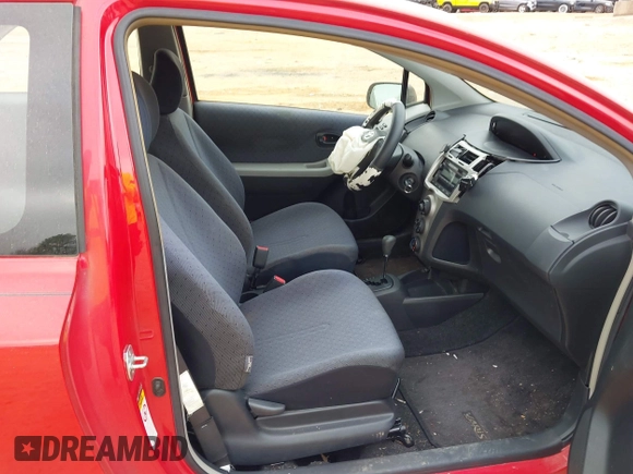 2009 Toyota Yaris with VIN JTDJT903595243068, listed as a IAAI auction lot 41899358 with 310,199 mi miles. Bid and sale history available at carsss.com. Image 5.
